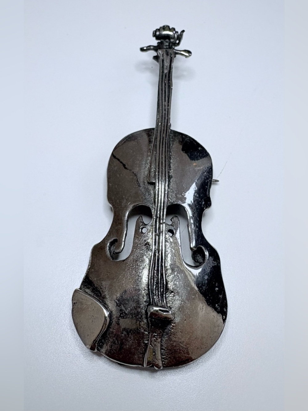 Vintage D. Pollak violin brooch.